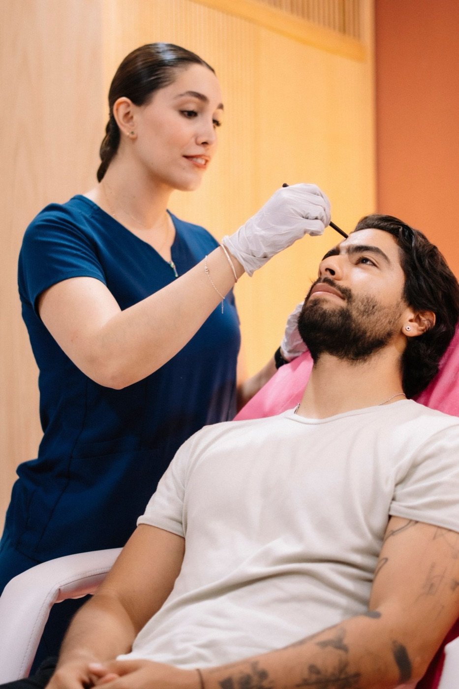 Groom-to-be receiving a skin treatment